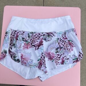 Athleta floral and white lined shirts size small